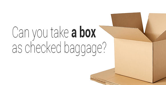 An open cardboard box next to flat-packed boxes with the text: Can you take a box as checked baggage?