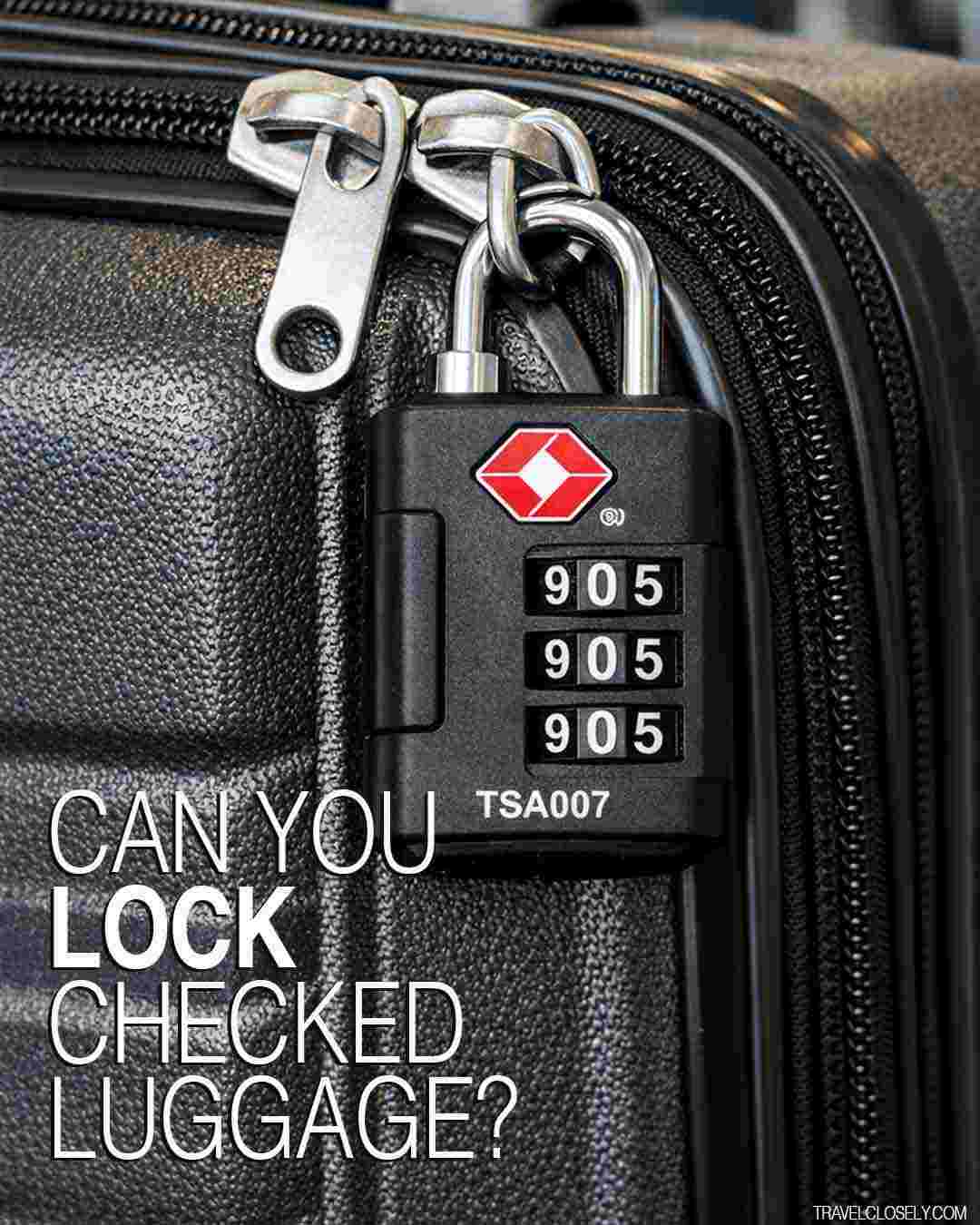 Close-up of a TSA-approved lock securing a hard-sided suitcase zipper at an airport check-in counter