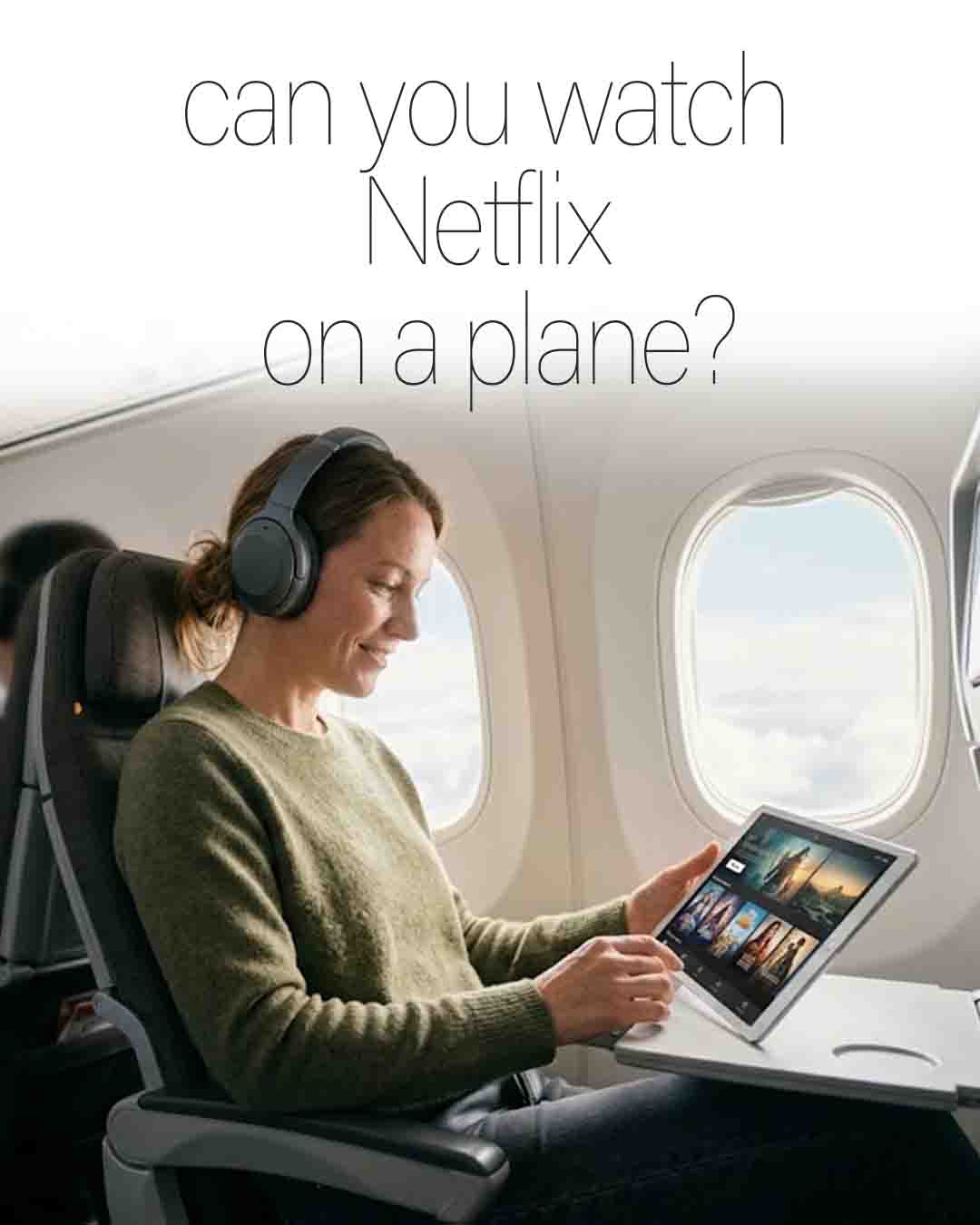 Woman watching Netflix on a tablet during a flight