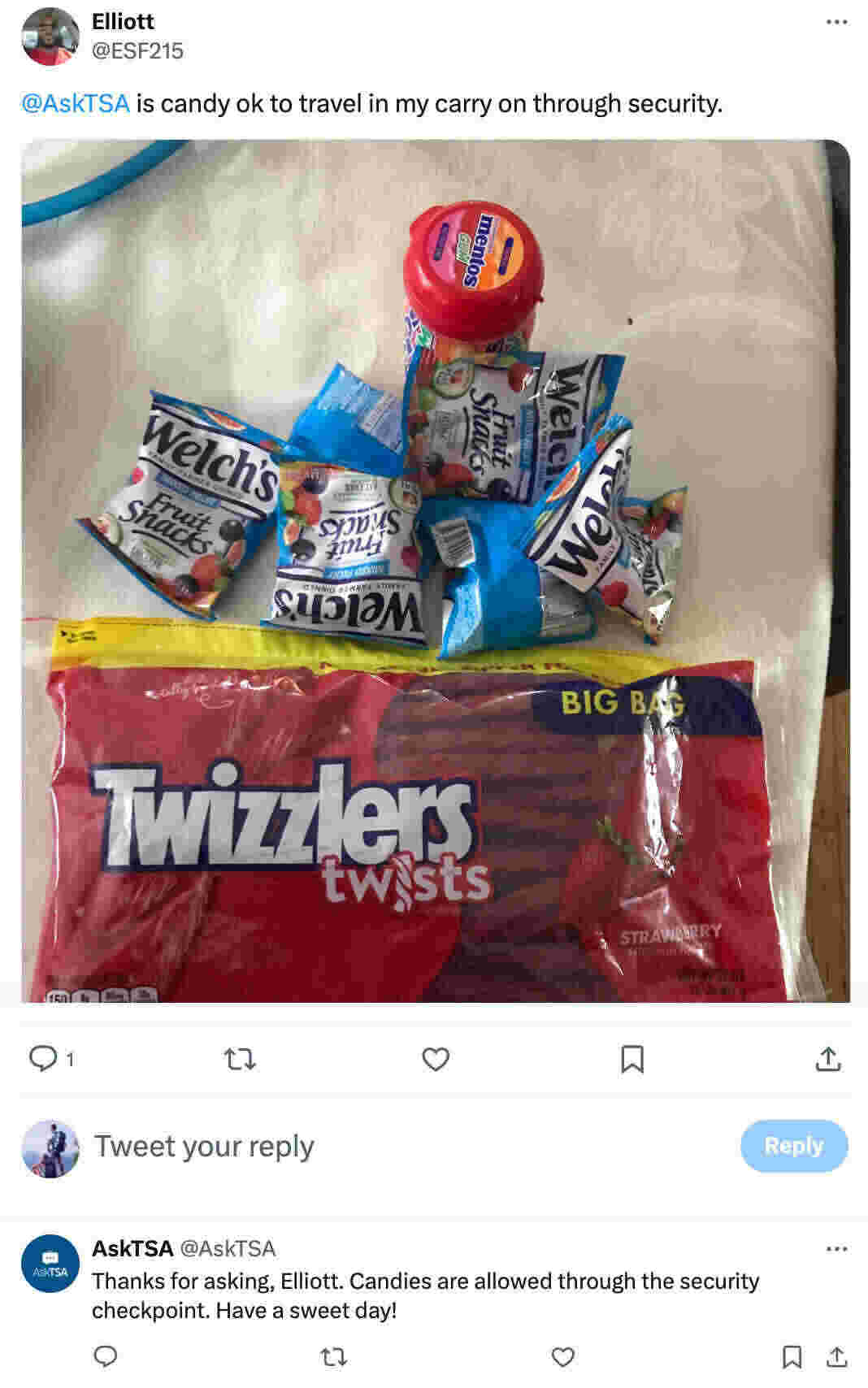 Screenshot of a tweet asking TSA if candy is allowed in carry-on bags, with TSA confirming that candy is permitted through security