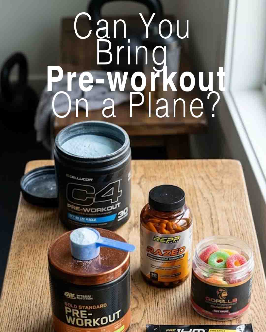Pre-workout supplements on a wooden table (powder tub, capsules, gummies) with overlaid text "can you bring pre-workout on a Plane?"